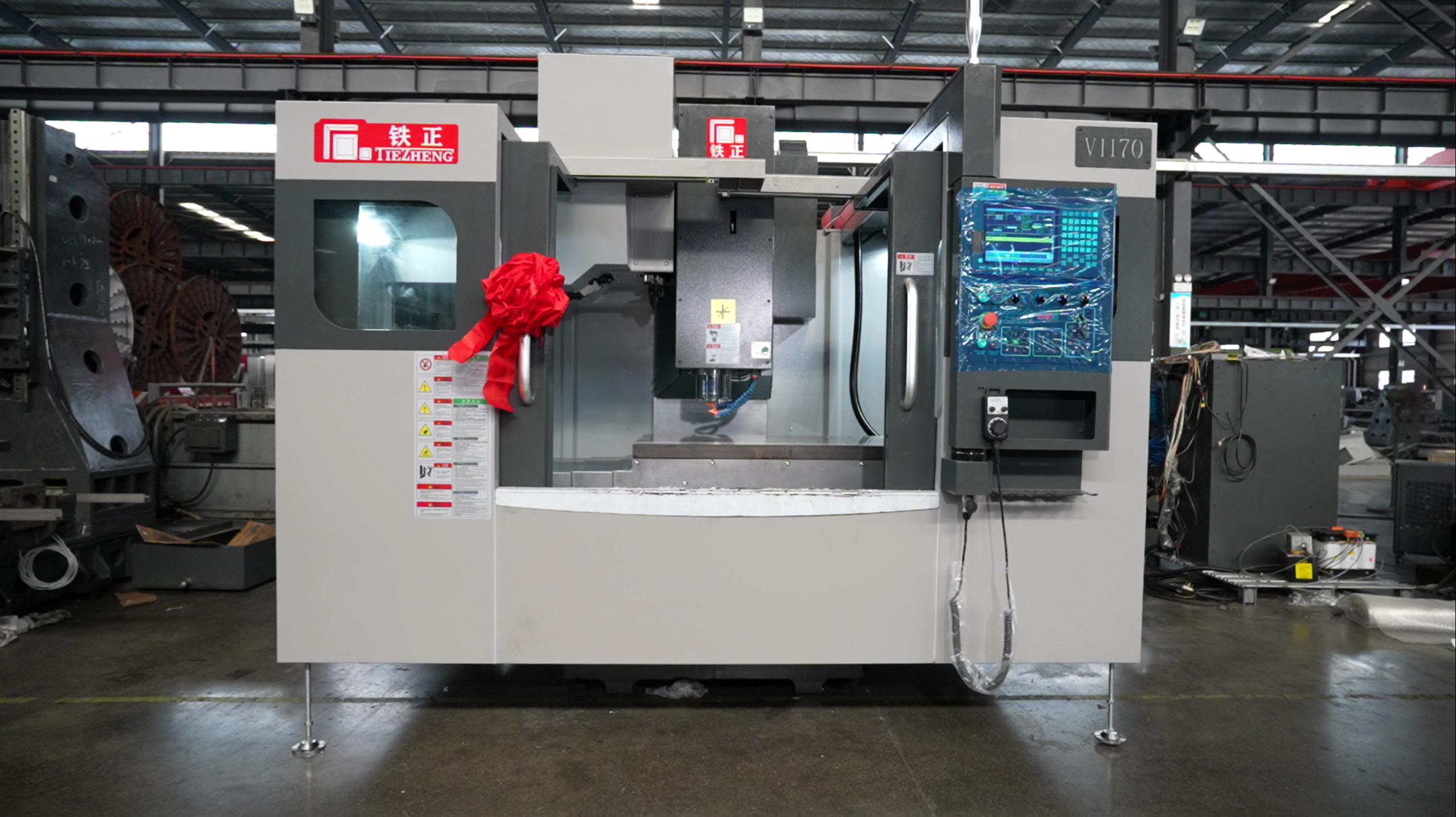 Tiezheng V1160 vertical machining center in workshop environment
